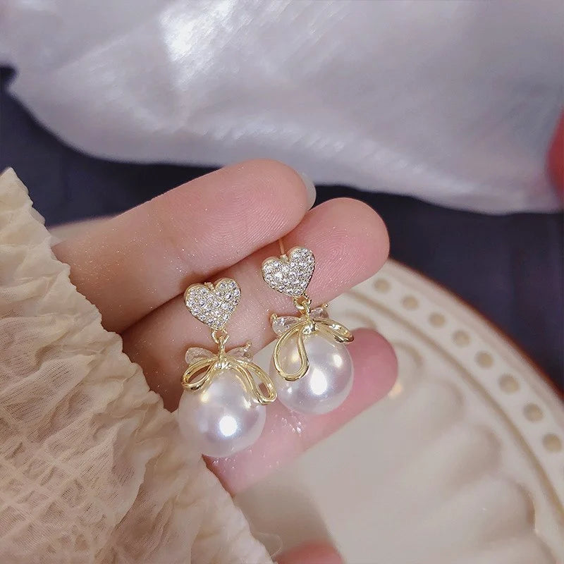 Gold Plated Heart & Pearl Bow Drop Earrings